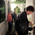 Visitors to the show getting refreshments on the balcony of Alberton House.